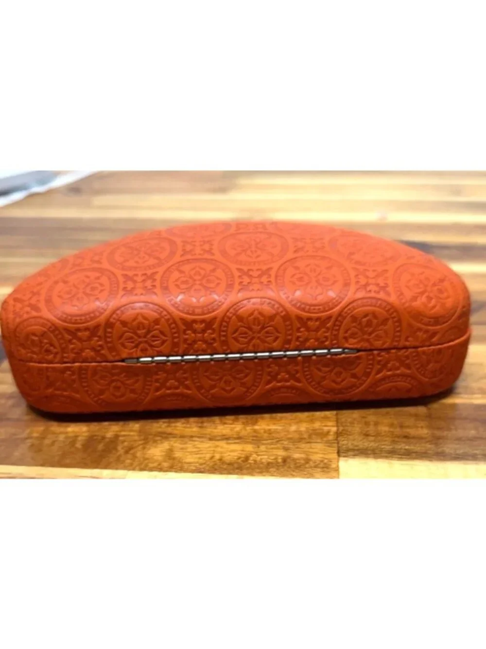 Nice pair of sunglasses with hard embossed case, cleaning cloth
